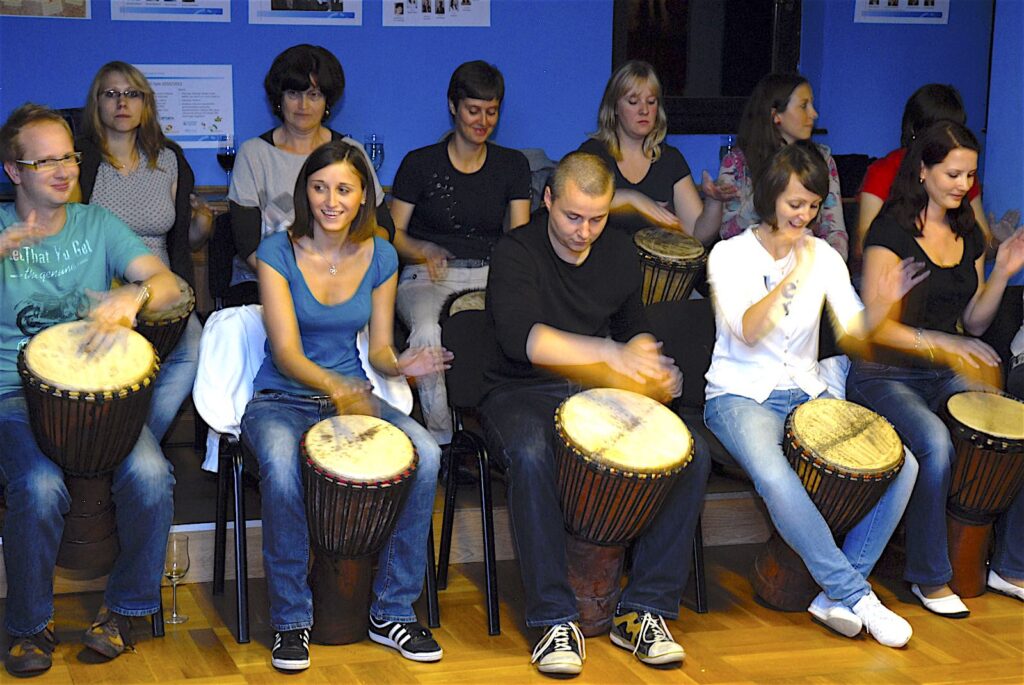 Clients enjoying drumming on djembe drums
