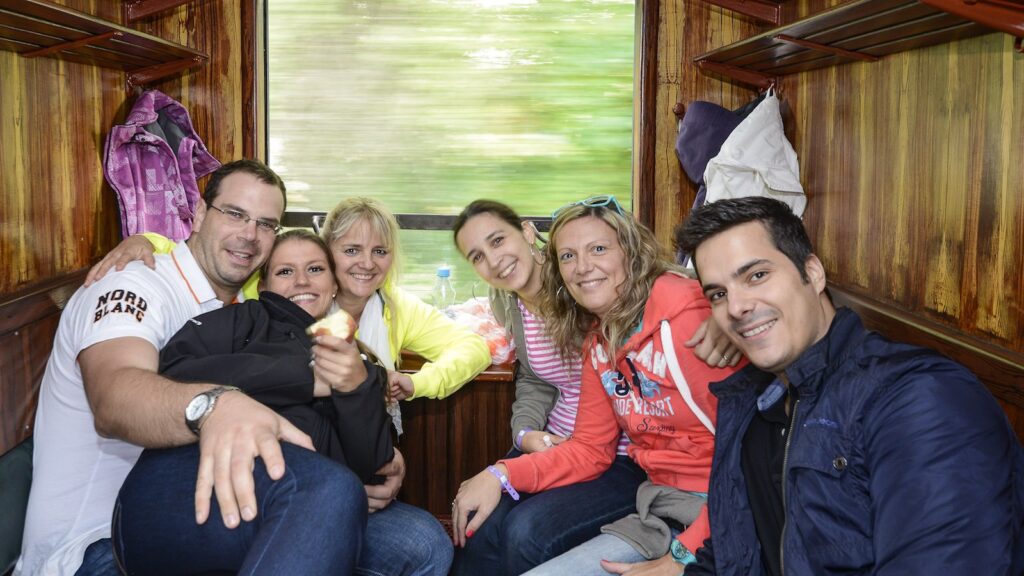 Group in a historical steam train