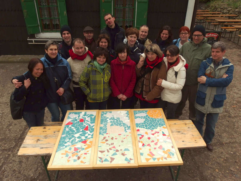 Group with their completed mosaic