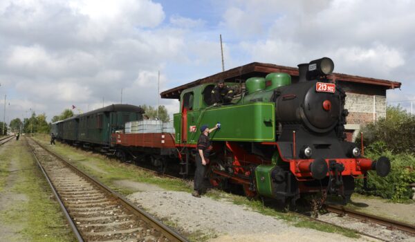 Historical steam train on one of Prague train stations