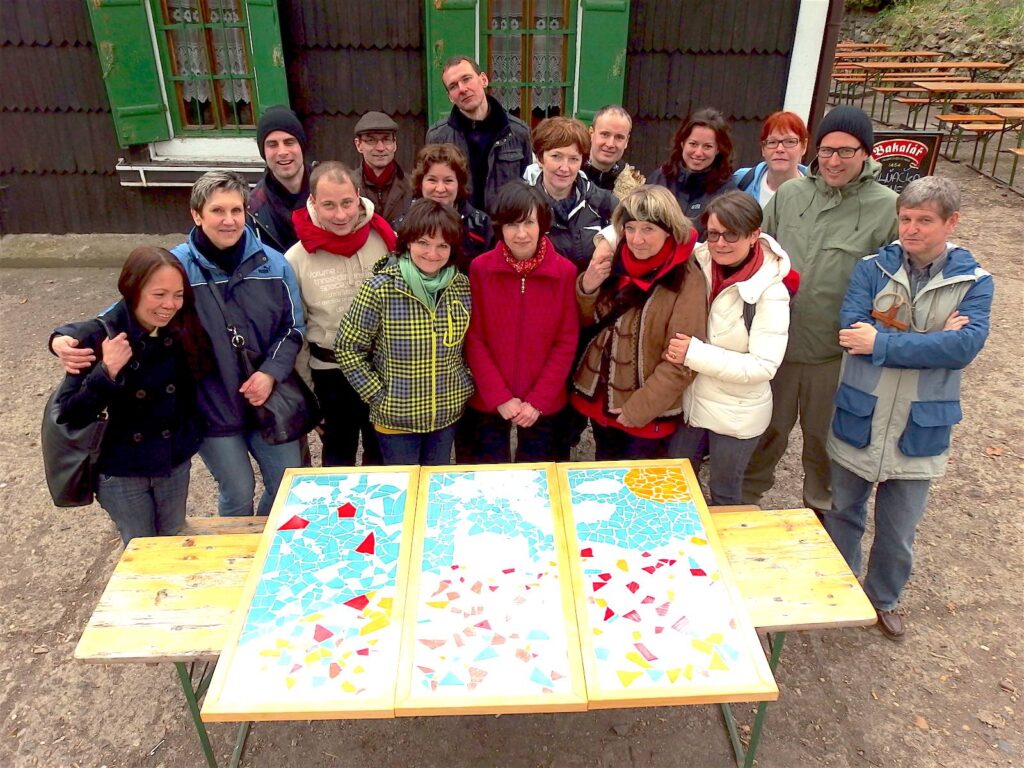 Group with their completed mosaic